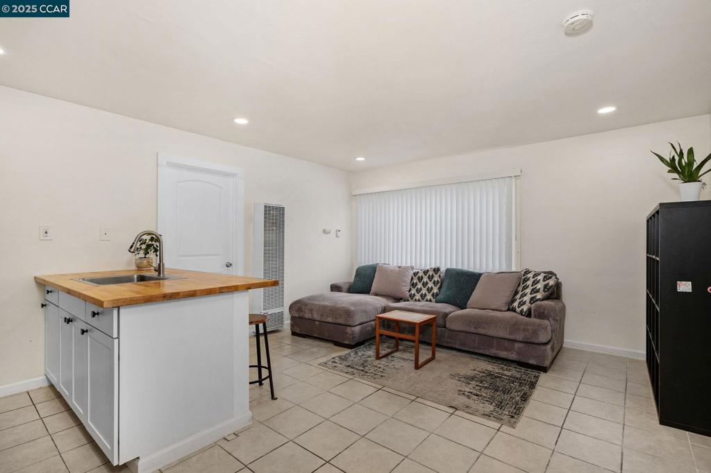 1926 Alcatraz Avenue Berkeley, CA 94703 - Photo 6 of 14 a living room with furniture and a table