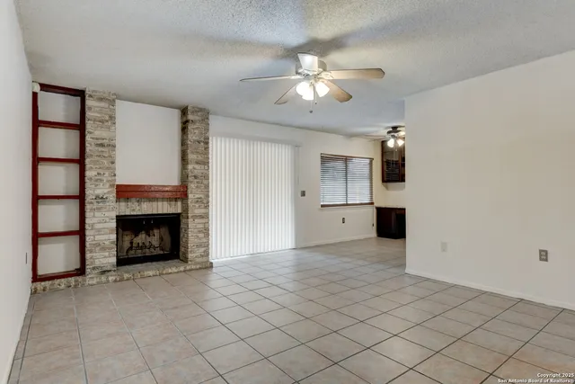 a large kitchen with a stove and a sink