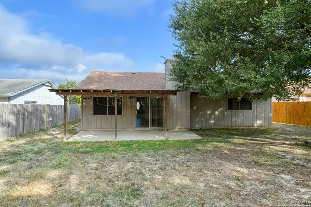 a backyard of a house with lots of green space
