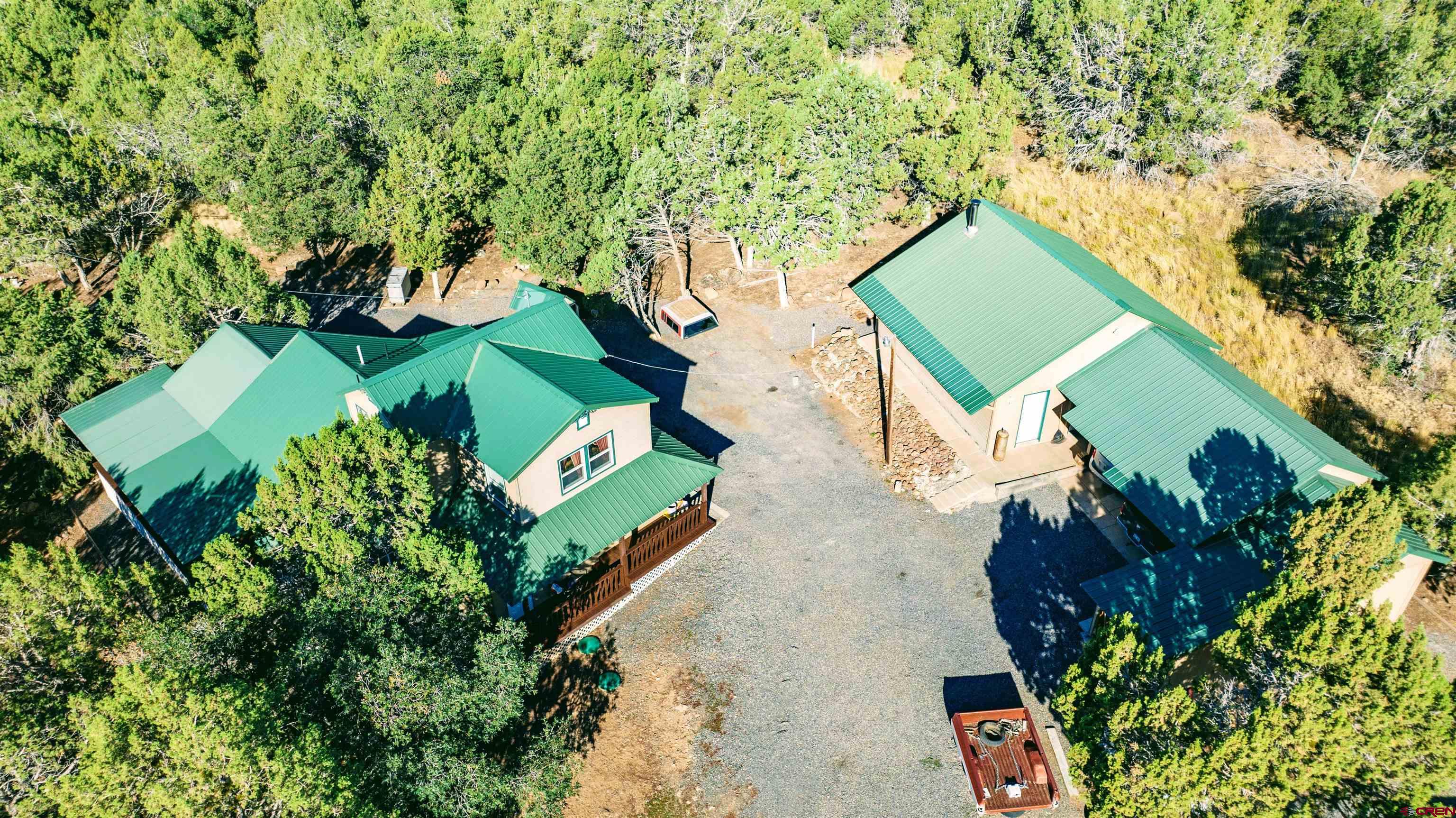 20915 Upland Road Cedaredge, CO 81413 - Photo 4 of 35 an aerial view of a house