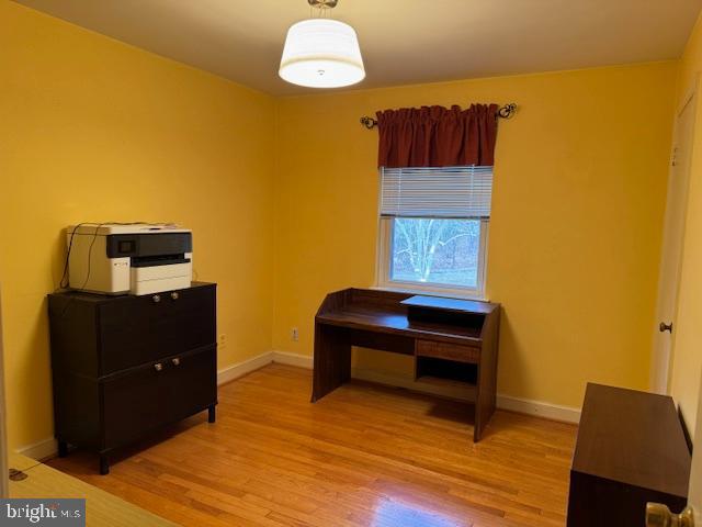 7201 Hawkins Creamery Road Gaithersburg, MD 20882 - Photo 14 of 19 a bedroom with a bed and dresser