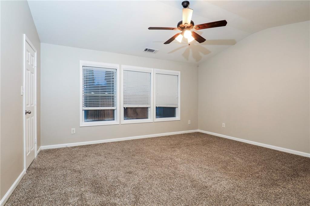 346 Beynon Terrace Suwanee, GA 30024 - Photo 7 of 17 a view of an empty room with a window