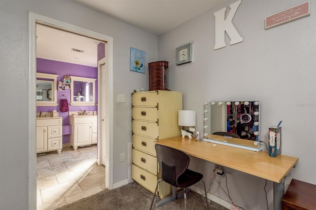 7487 Alhambra Court Spring Hill, FL 34606 - Photo 27 of 61 a view of a workspace with furniture