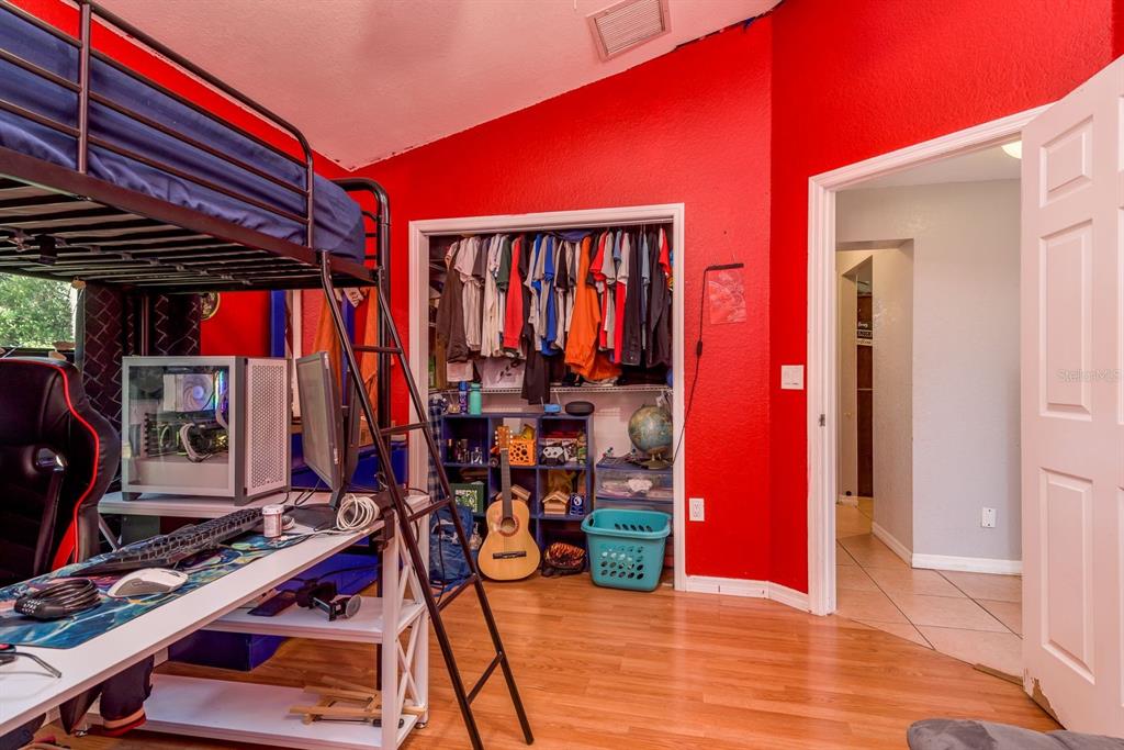 7487 Alhambra Court Spring Hill, FL 34606 - Photo 33 of 58 a view of a room with gym equipment