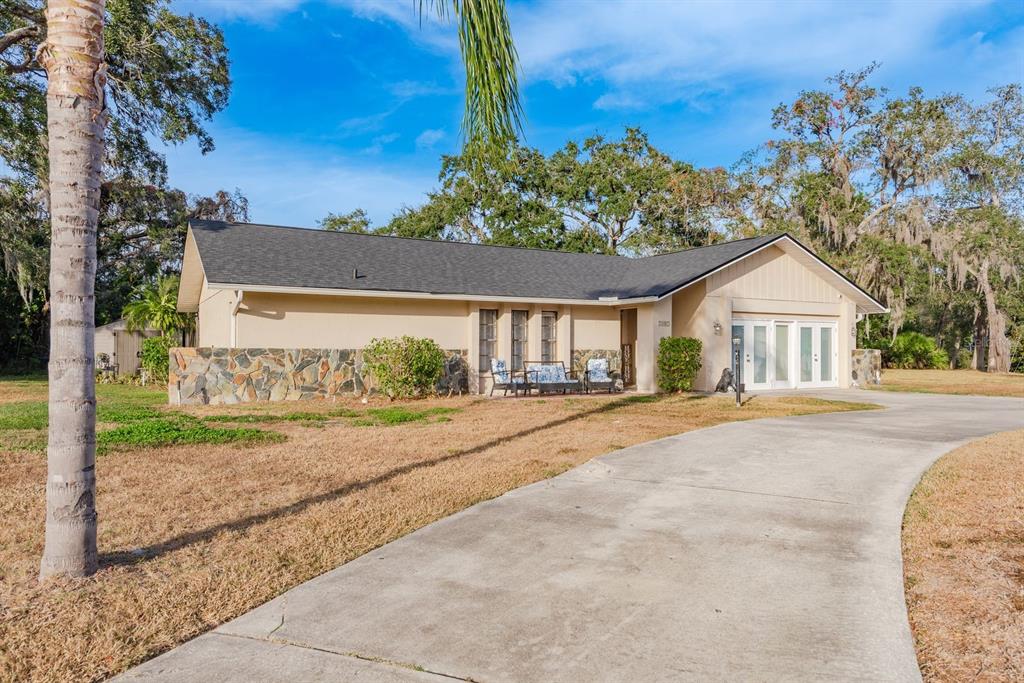 7487 Alhambra Court Spring Hill, FL 34606 - Photo 51 of 58 a view of house with a street