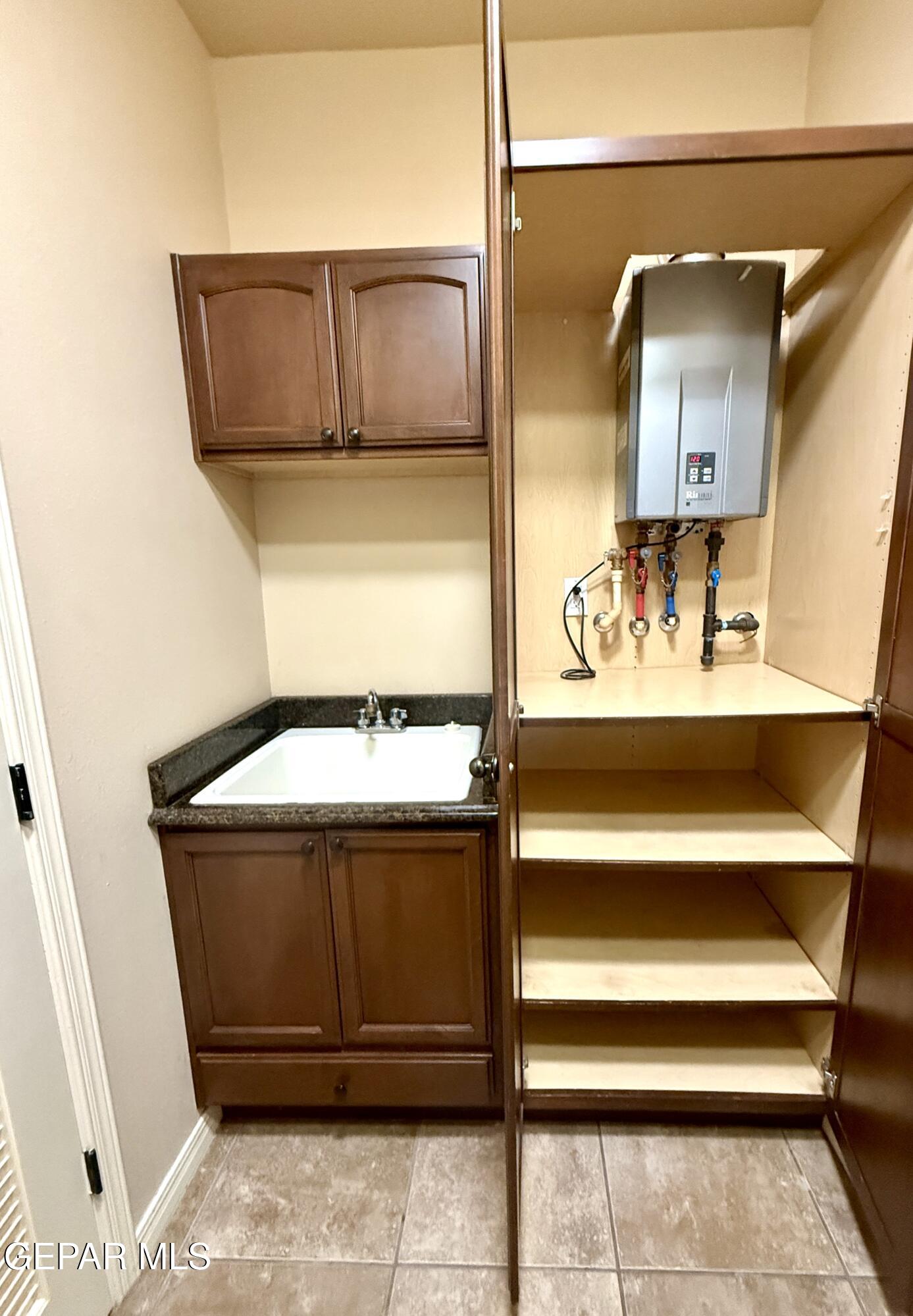 3060 Solar Point Lane El Paso, TX 79938 - Photo 26 of 49 3060- Tankless Water Heater