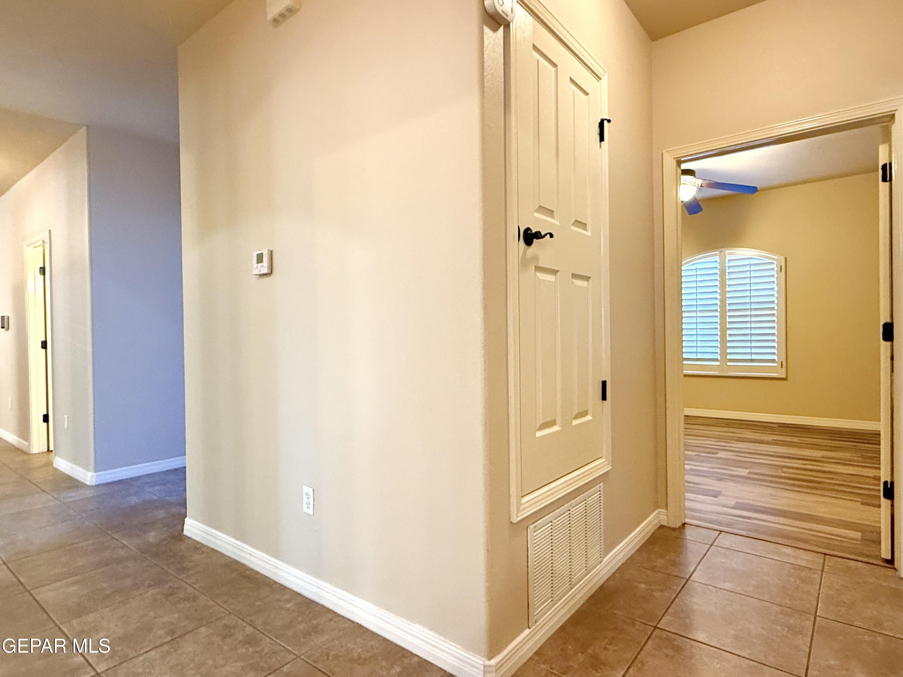 3060 Solar Point Lane El Paso, TX 79938 - Photo 36 of 49 a bathroom with a glass shower door