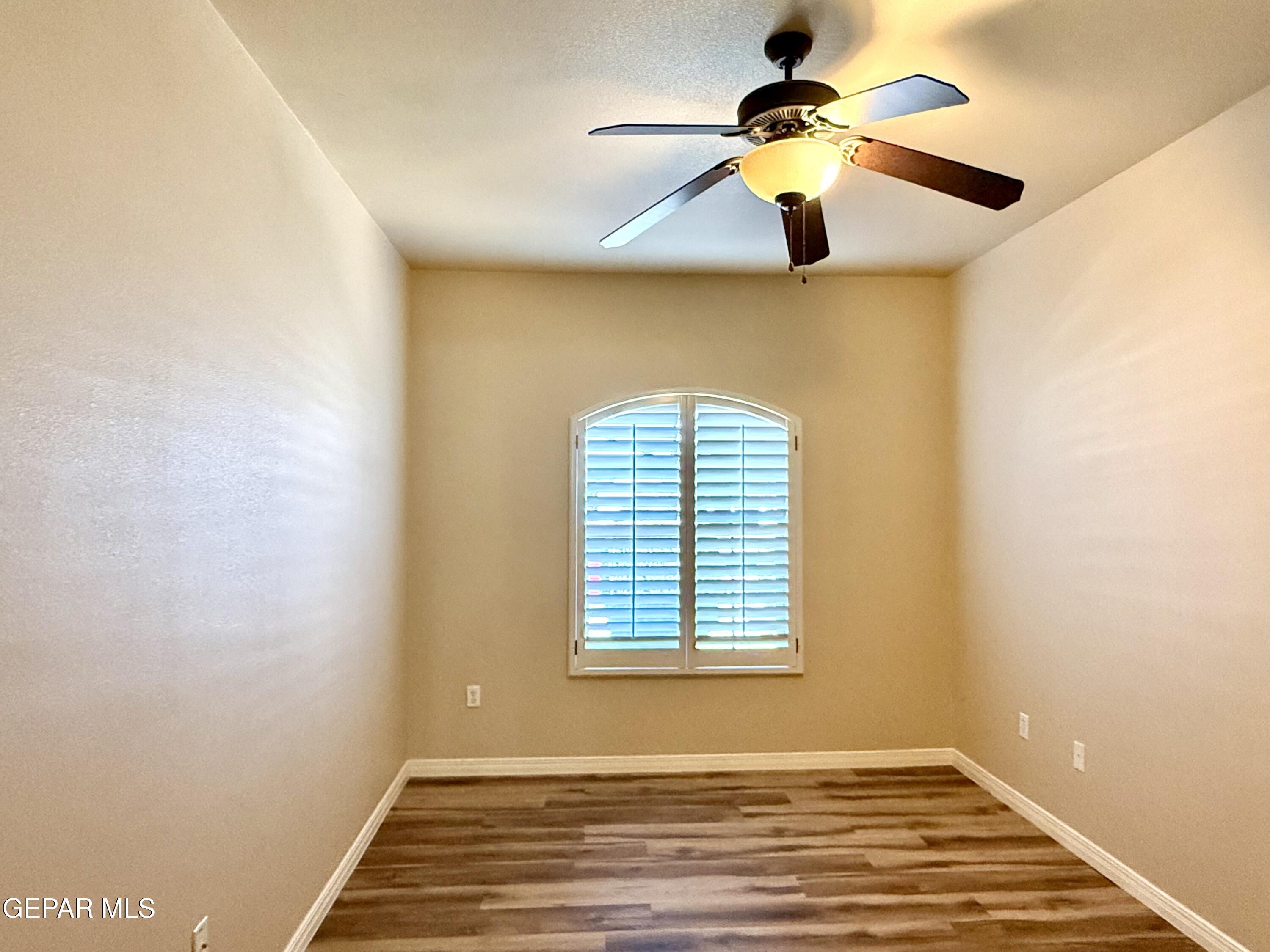 3060 Solar Point Lane El Paso, TX 79938 - Photo 40 of 49 a view of room with a ceiling fan and window
