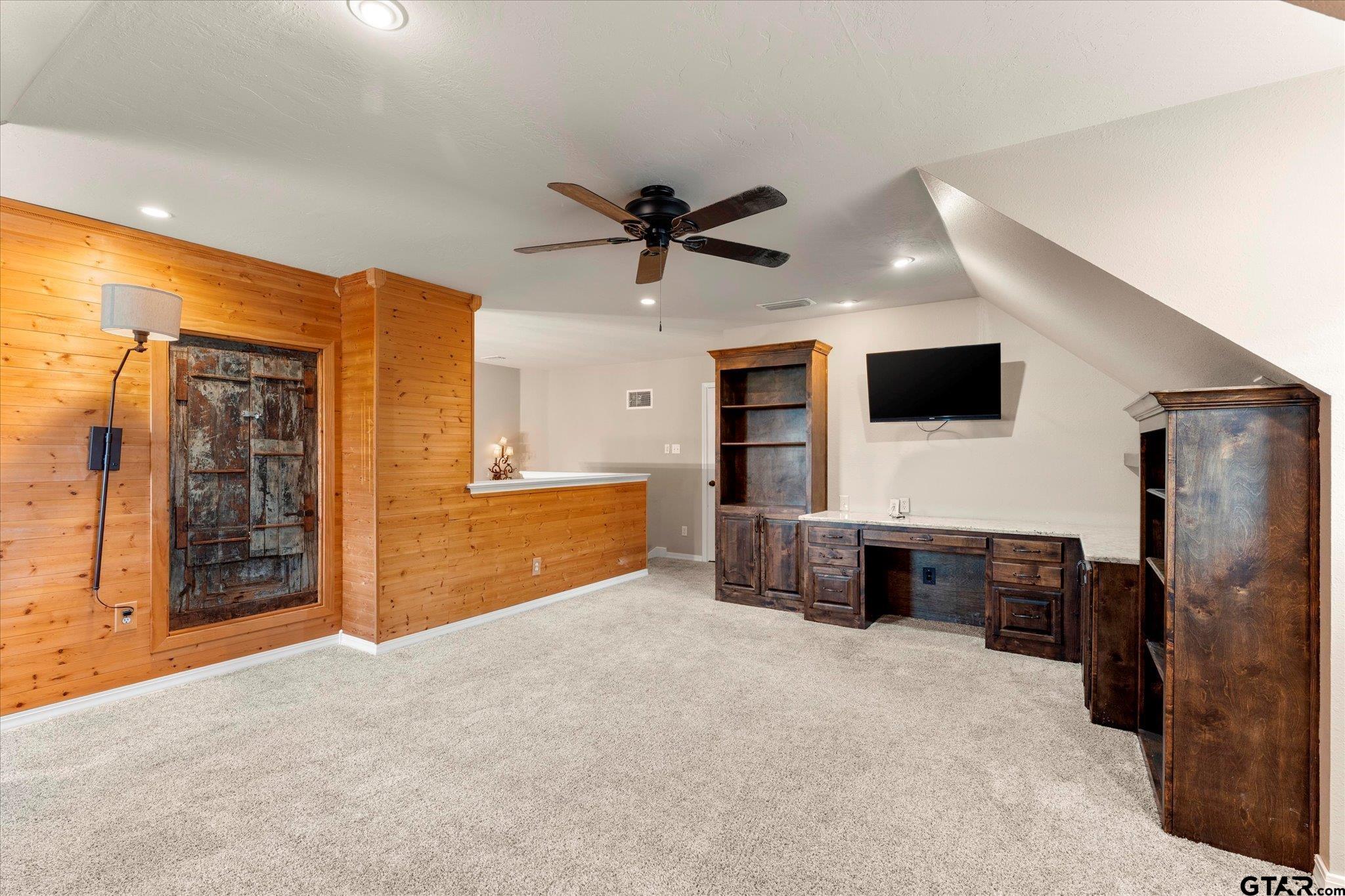 1879 Fig Road Gilmer, TX 75645 - Photo 25 of 46 a living room with furniture and a flat screen tv