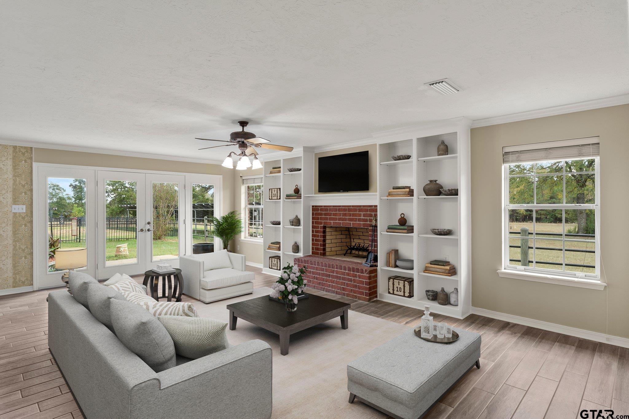 1879 Fig Road Gilmer, TX 75645 - Photo 31 of 46 a living room with furniture fireplace and flat screen tv