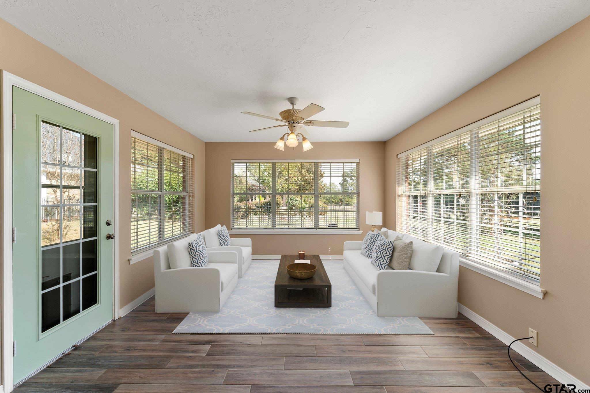 1879 Fig Road Gilmer, TX 75645 - Photo 33 of 46 a living room with furniture and a large window