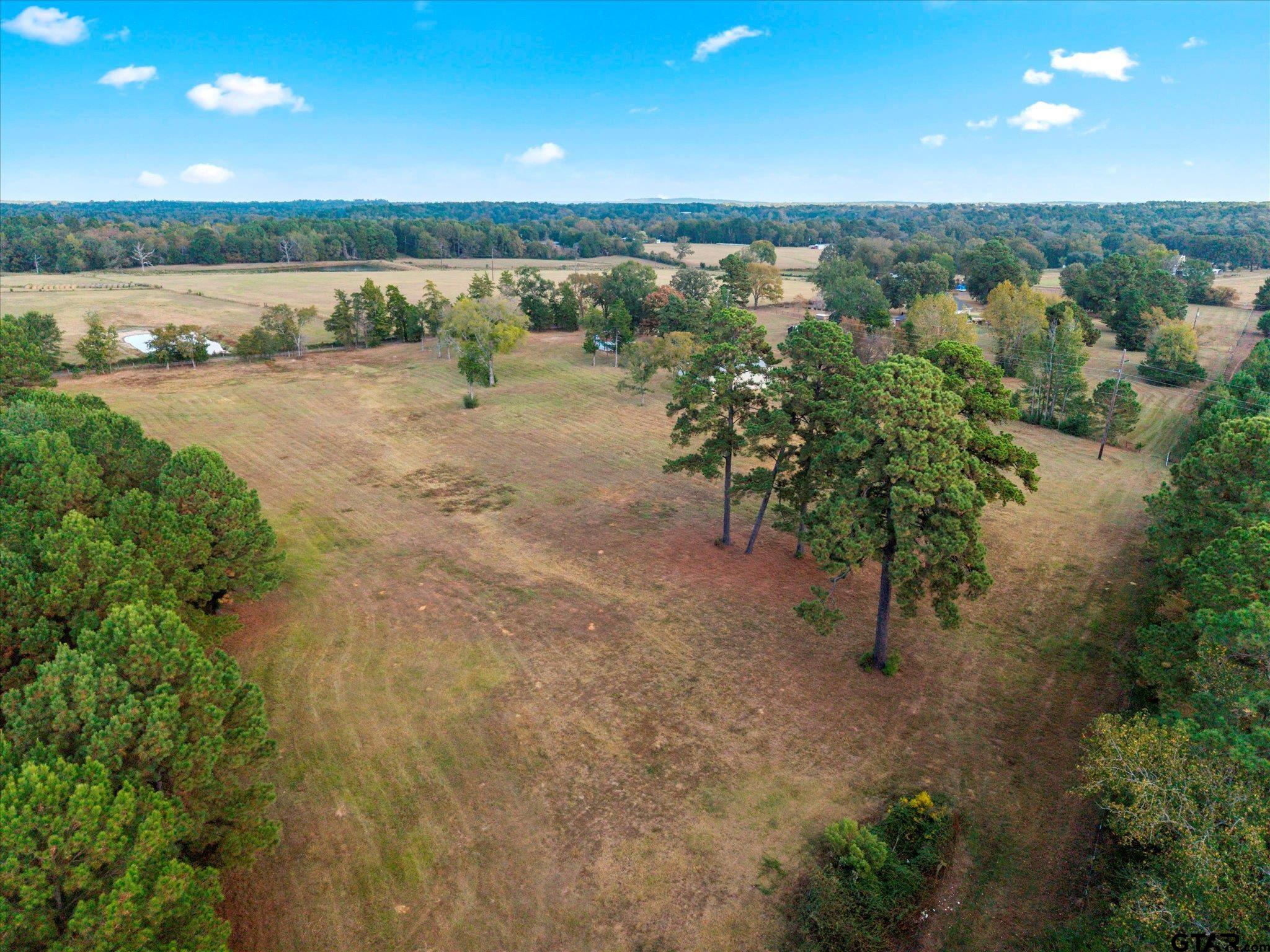 1879 Fig Road Gilmer, TX 75645 - Photo 45 of 46 a view of a lake with outdoor space