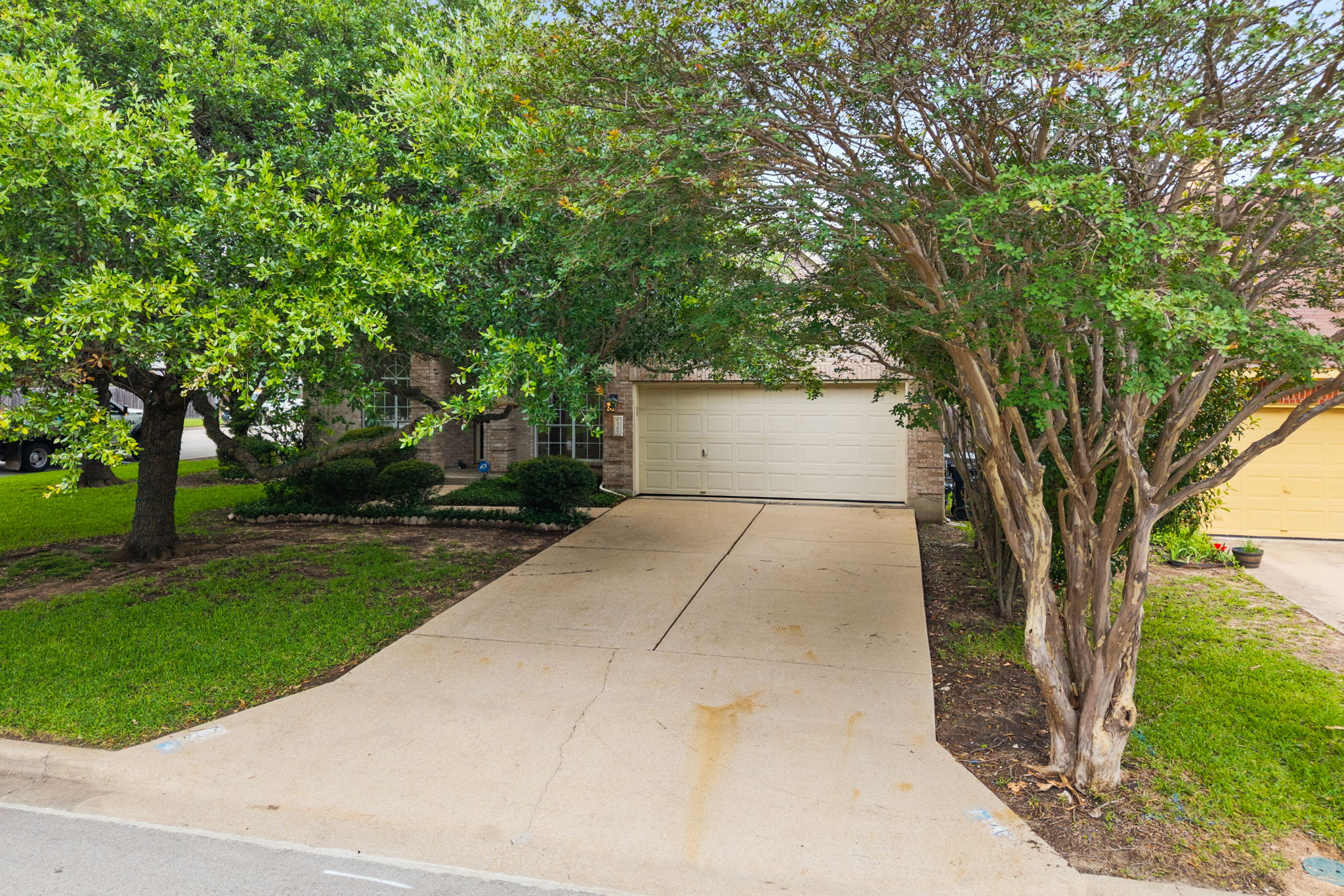 707 Ridge View Drive Leander, TX 78641 - Photo 4 of 40 a view of a yard with plants and trees