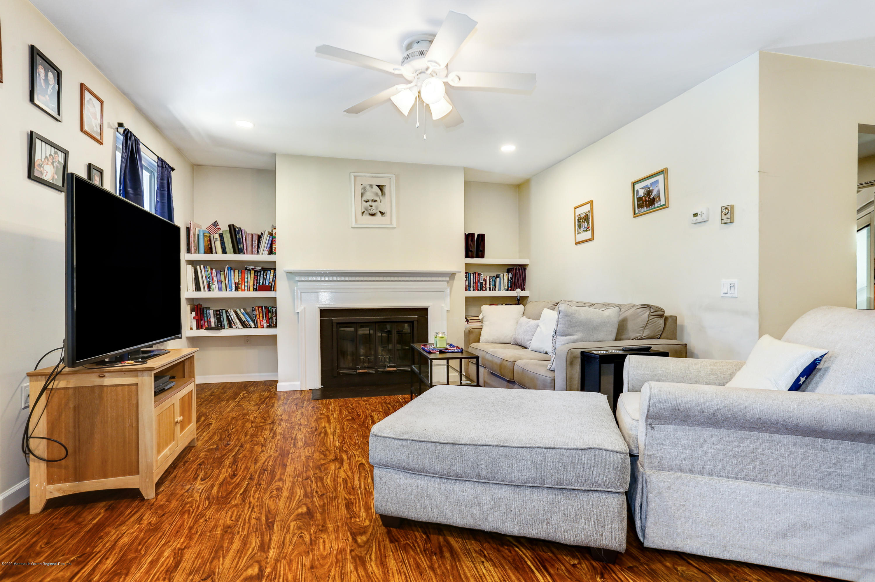 84 Sunset Road, Unit 60 Whiting, NJ 08759 - Photo 12 of 51 a living room with furniture fireplace and flat screen tv