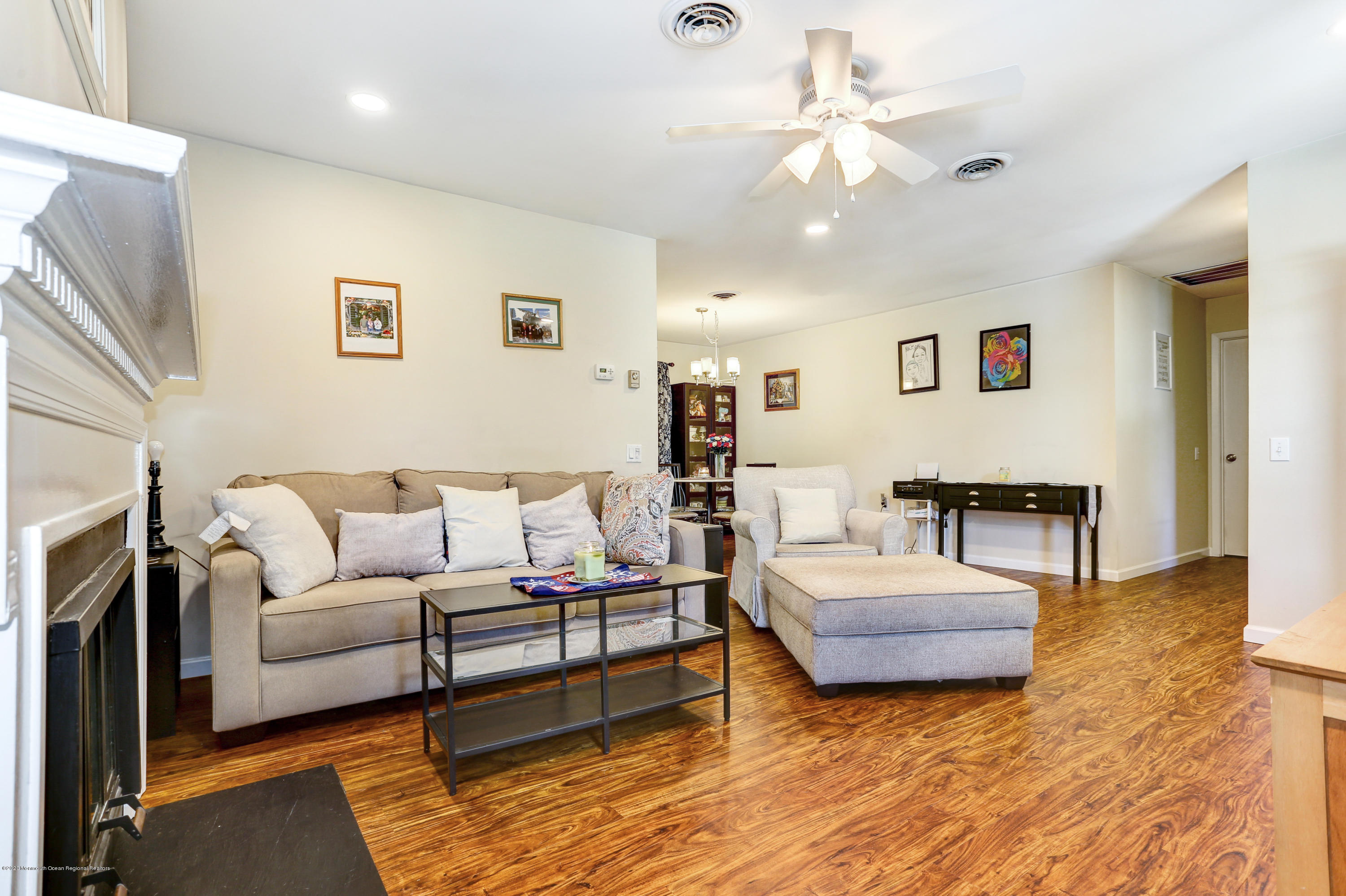 84 Sunset Road, Unit 60 Whiting, NJ 08759 - Photo 15 of 51 a living room with furniture and a fireplace