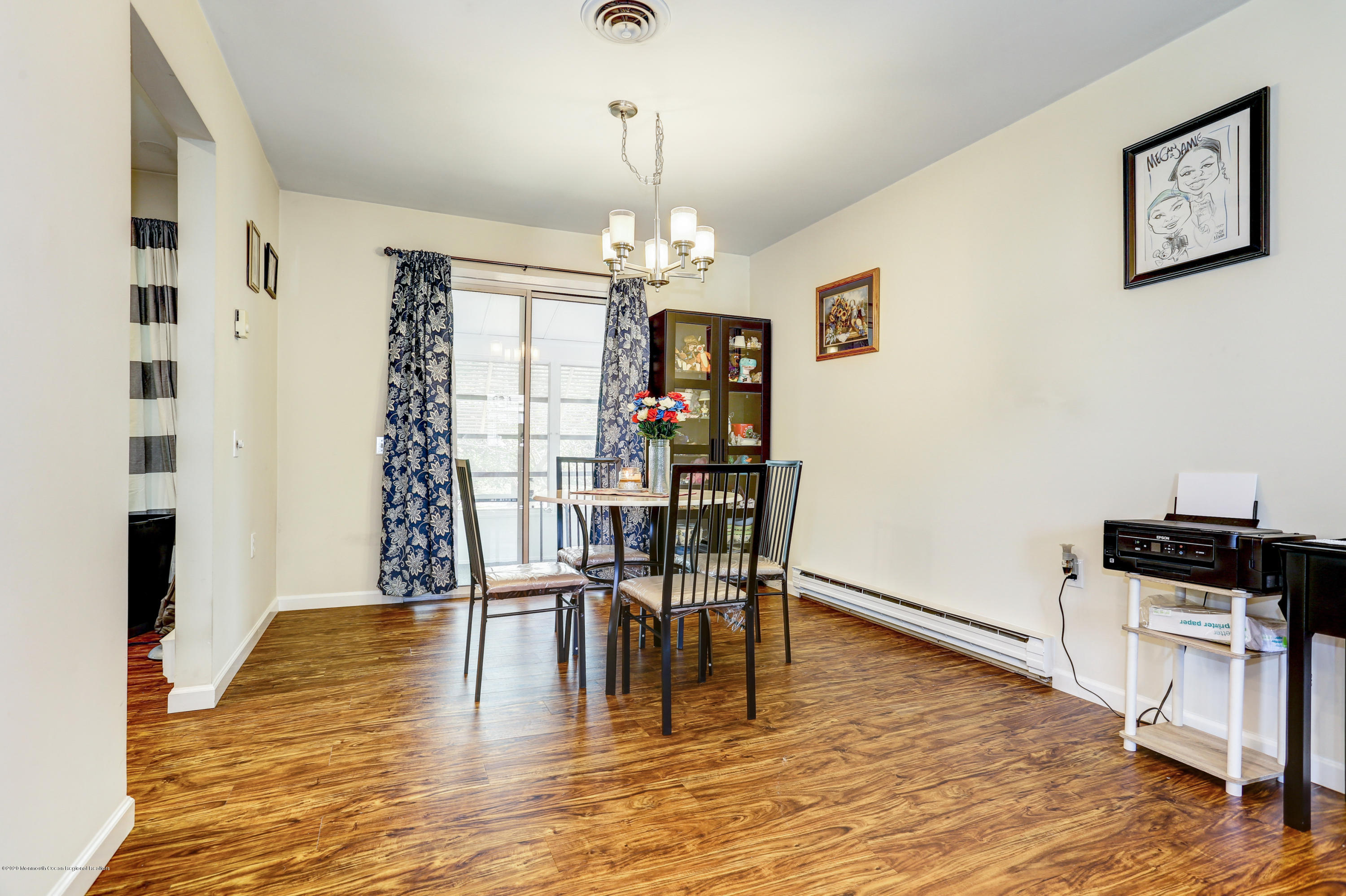 84 Sunset Road, Unit 60 Whiting, NJ 08759 - Photo 18 of 51 a view of a dining room with furniture and wooden floor