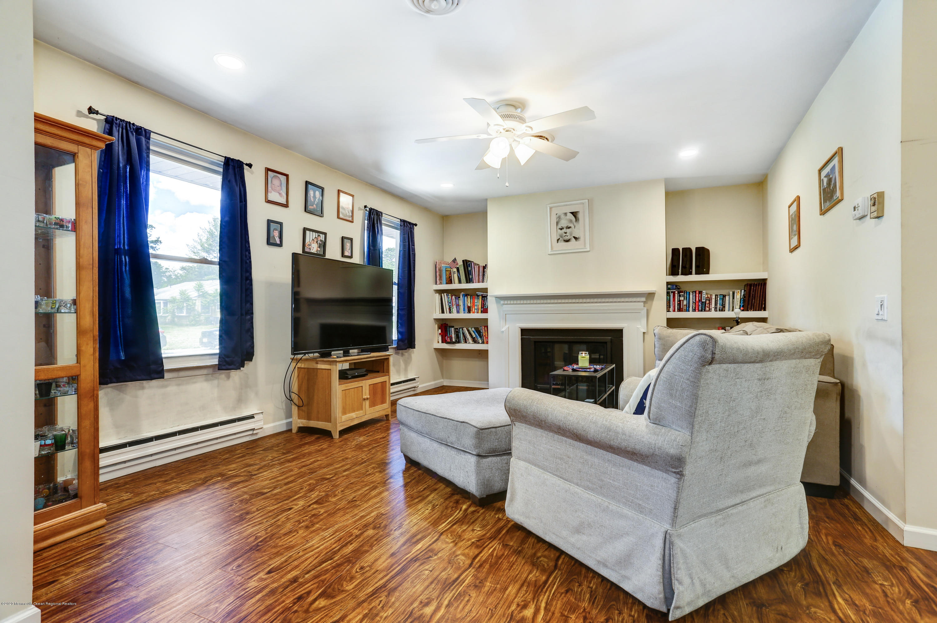 84 Sunset Road, Unit 60 Whiting, NJ 08759 - Photo 20 of 51 a living room with furniture and a flat screen tv