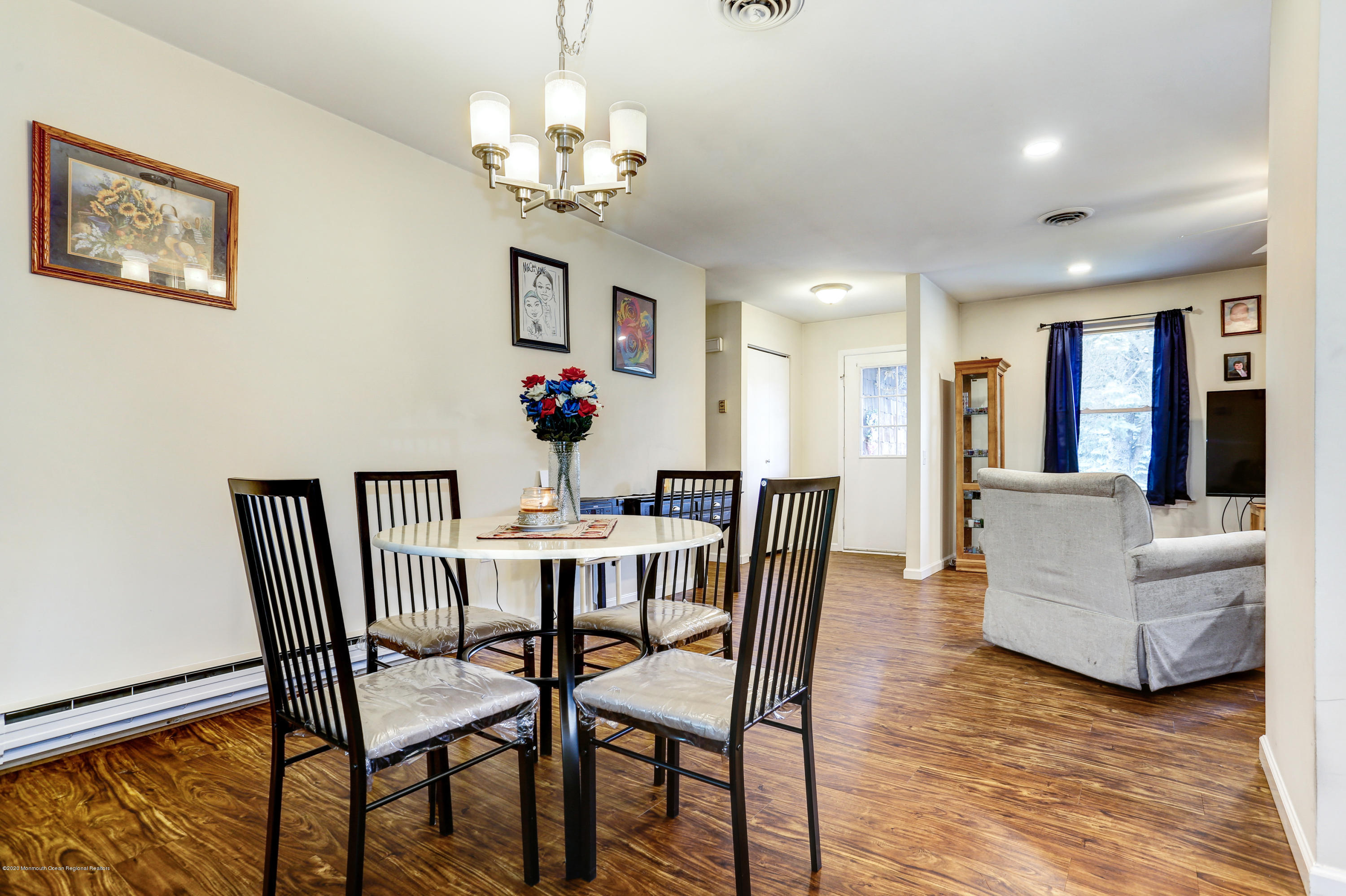 84 Sunset Road, Unit 60 Whiting, NJ 08759 - Photo 21 of 51 a view of a dining room with furniture and wooden floor