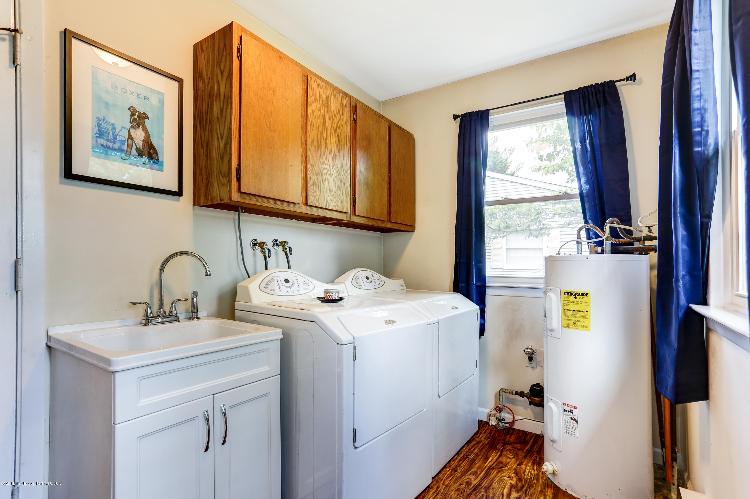 84 Sunset Road, Unit 60 Whiting, NJ 08759 - Photo 28 of 51 a utility room with dryer and washer
