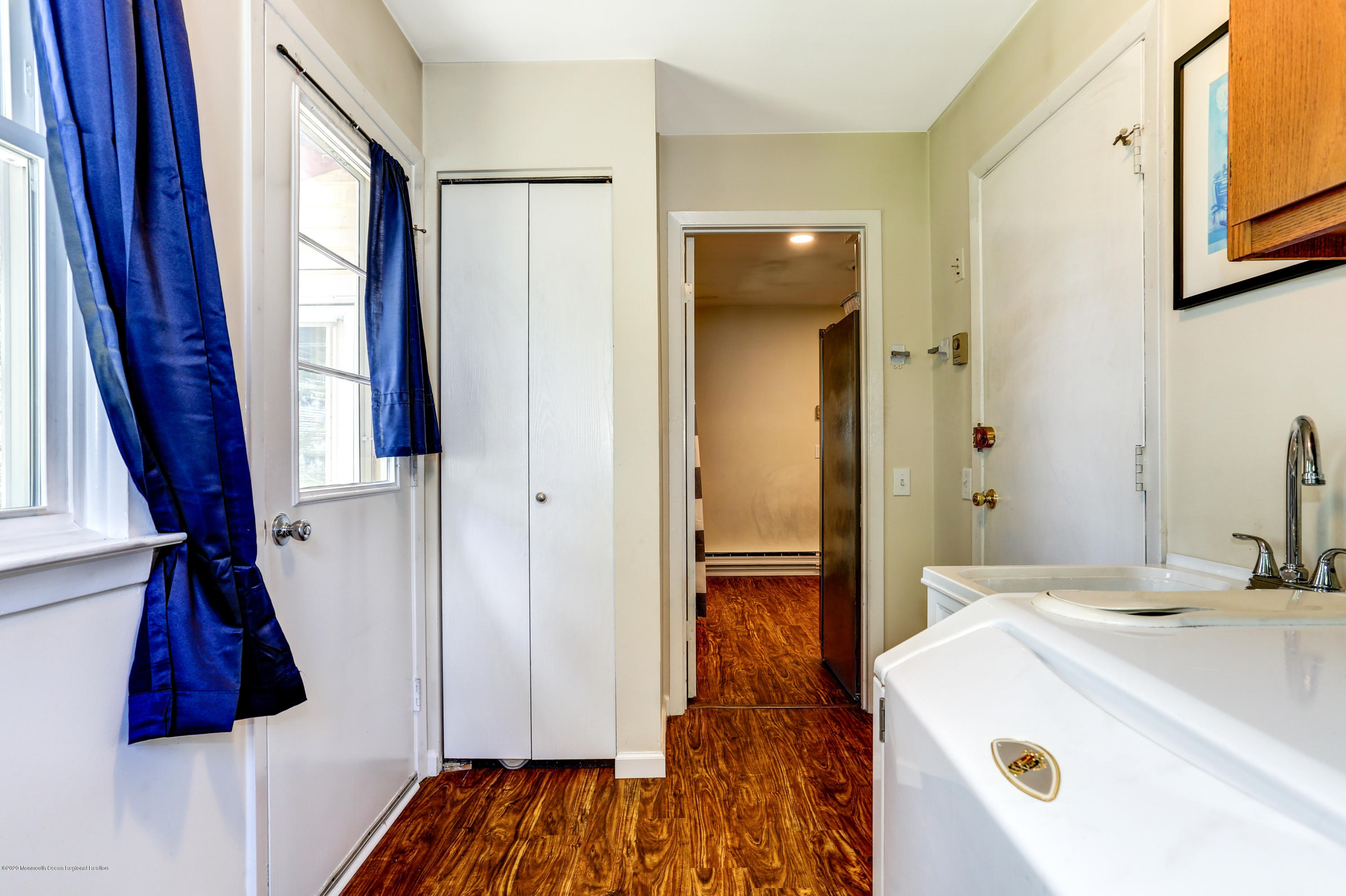 84 Sunset Road, Unit 60 Whiting, NJ 08759 - Photo 29 of 51 a bathroom with a sink and a mirror
