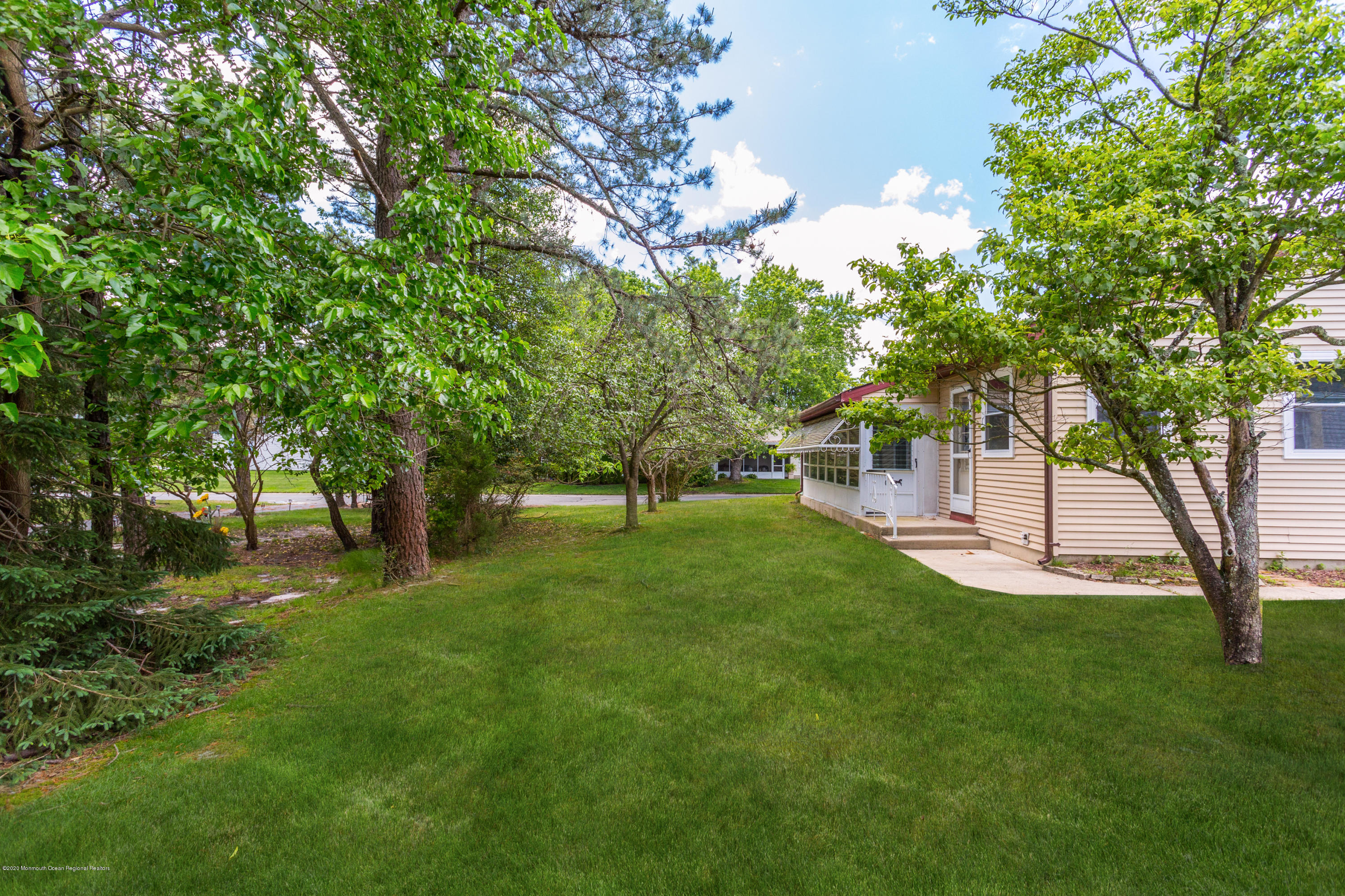 84 Sunset Road, Unit 60 Whiting, NJ 08759 - Photo 45 of 51 a huge green field with lots of trees