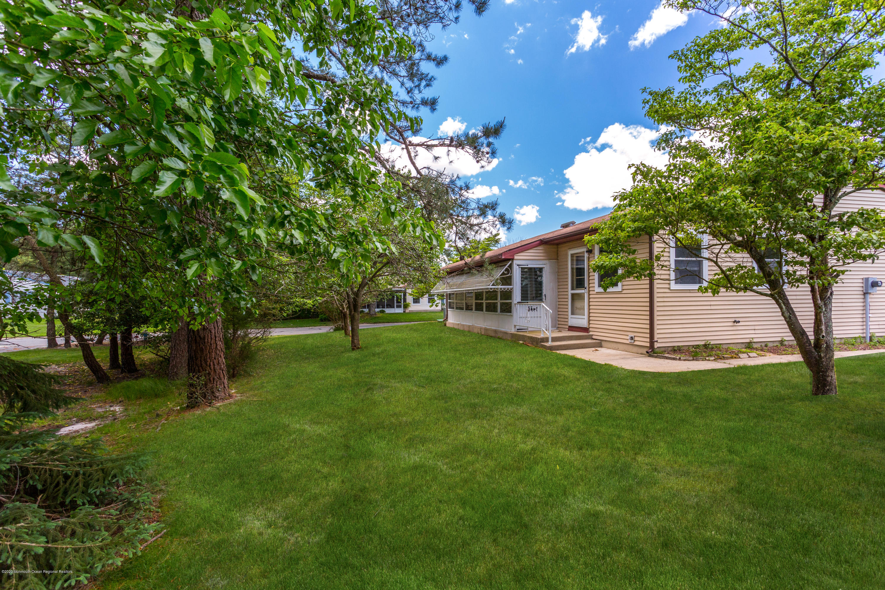 84 Sunset Road, Unit 60 Whiting, NJ 08759 - Photo 46 of 51 a view of a house with a backyard