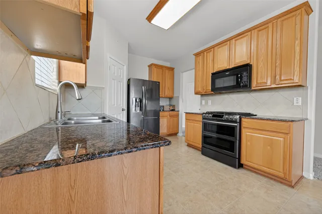 $335,000 | 2703 Blue Mills Court, Katy, TX 77449