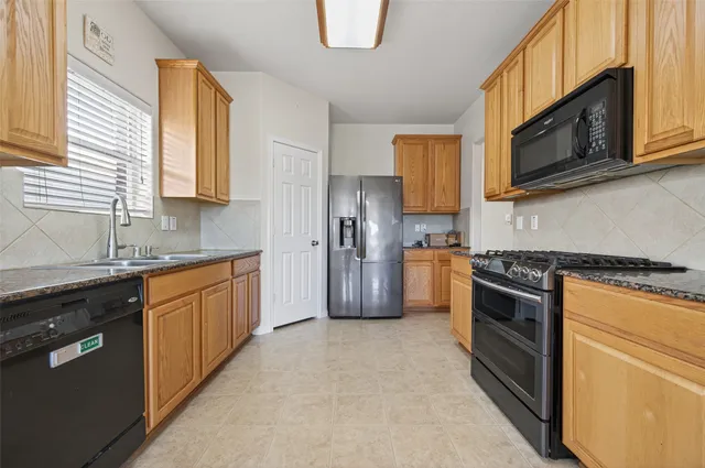 $335,000 | 2703 Blue Mills Court, Katy, TX 77449