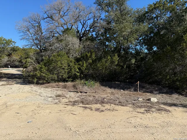 a view of a yard covered in snow