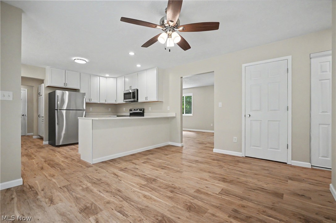7583 Yale Road Atwater, OH 44201 - Photo 17 of 41 Dining room opens into the large open kitchen.