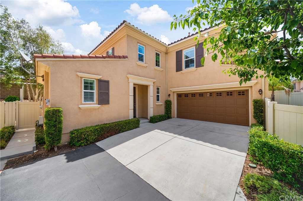 27472 Blackstone Road Temecula, CA 92591 - Photo 1 of 1 a front view of a house with garden