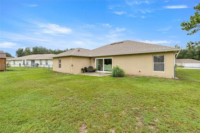 a front view of house with garden