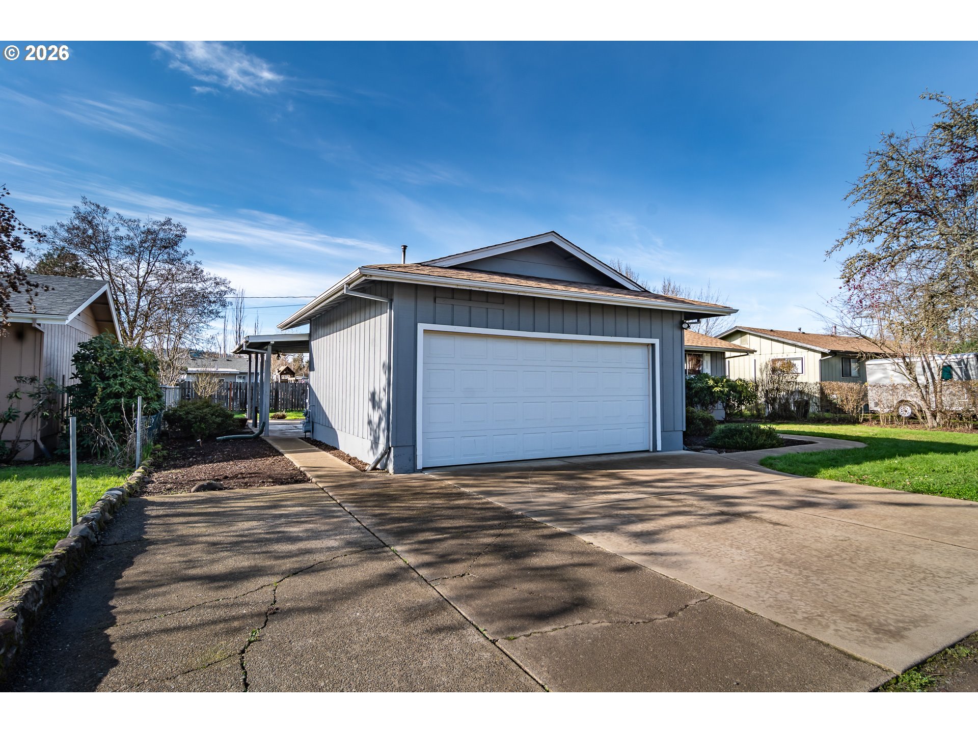 219 Hawthorne Street Sutherlin, OR 97479 - Photo 2 of 45 a view of a house with a yard