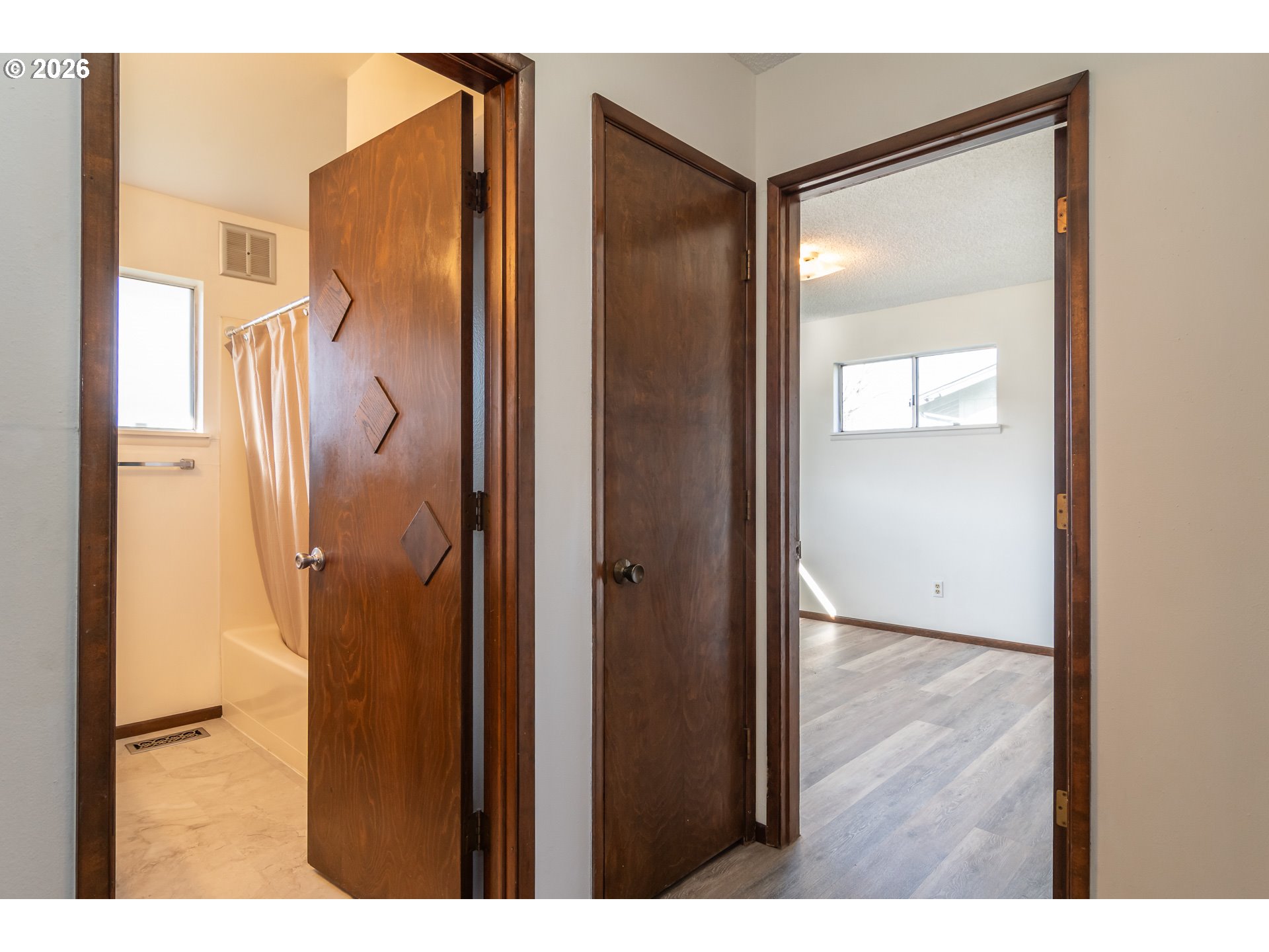 219 Hawthorne Street Sutherlin, OR 97479 - Photo 22 of 45 a bathroom with a glass door shower and a sink