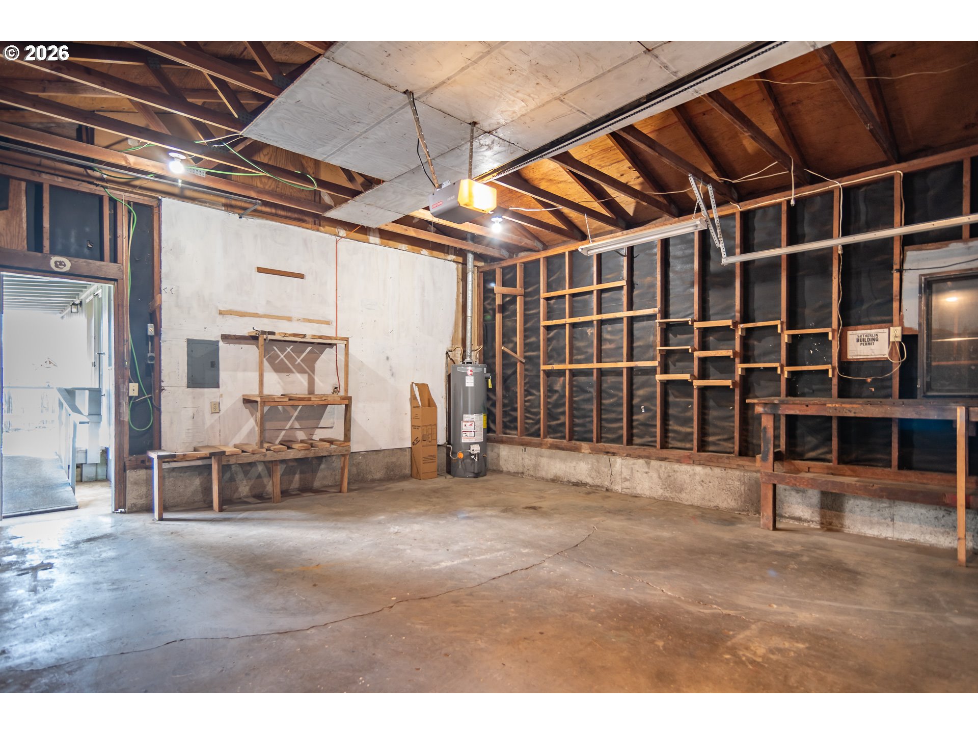 219 Hawthorne Street Sutherlin, OR 97479 - Photo 44 of 45 a view of an empty room with wooden floor