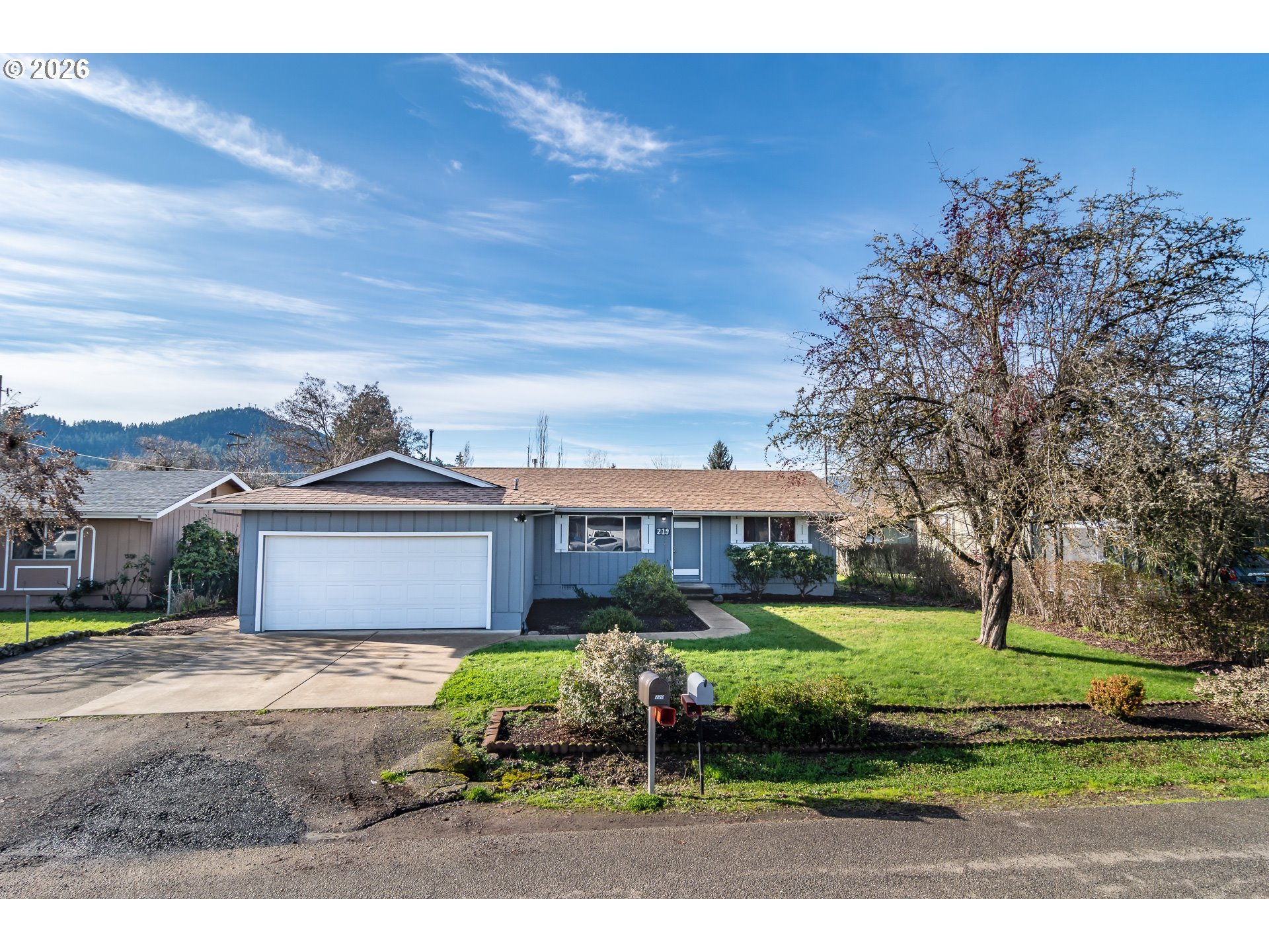 219 Hawthorne Street Sutherlin, OR 97479 - Photo 45 of 45 a view of a house with a yard