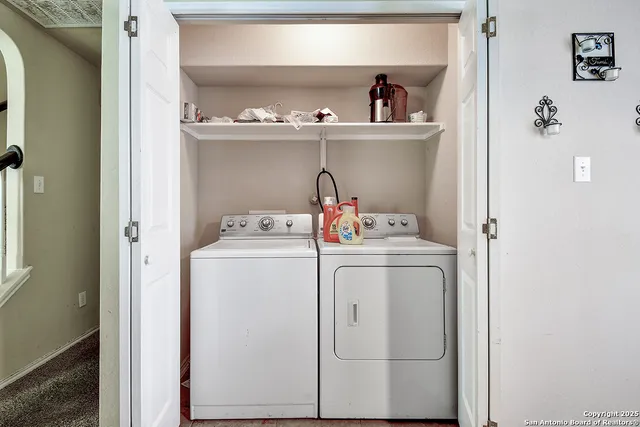 a utility room with dryer and washer
