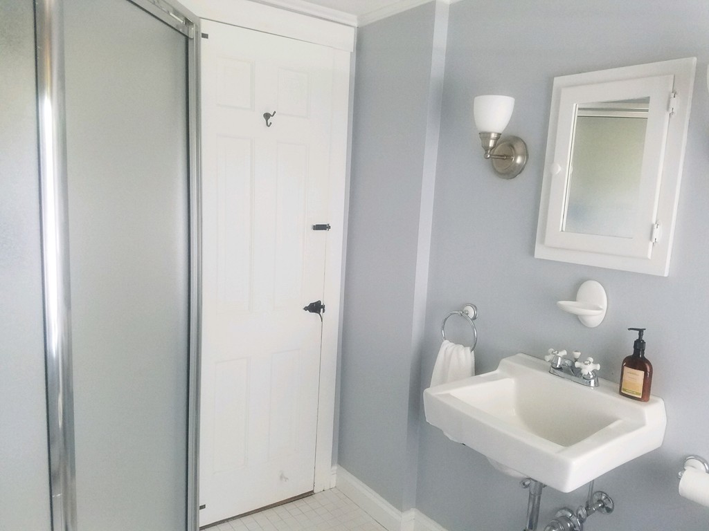 130 Argilla Road Andover, MA 01810 - Photo 16 of 24 a bathroom with a sink and a mirror