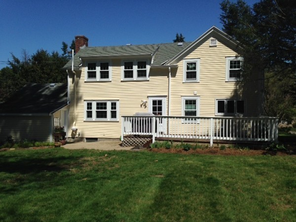 130 Argilla Road Andover, MA 01810 - Photo 20 of 24 a front view of a house with a yard
