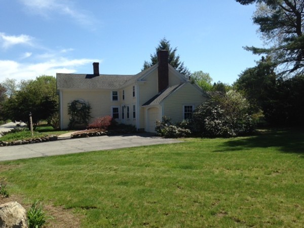 130 Argilla Road Andover, MA 01810 - Photo 3 of 24 a front view of a house with a yard and tree s