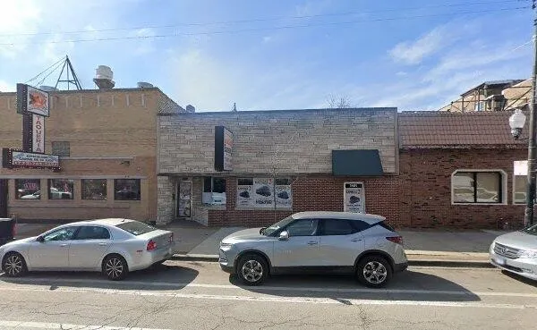 a car parked in front of a building