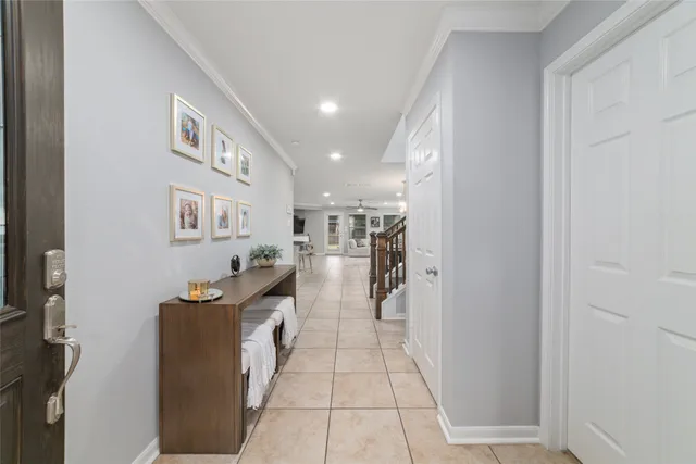 a kitchen with stainless steel appliances granite countertop a refrigerator and a stove