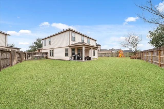 a house view with a garden space
