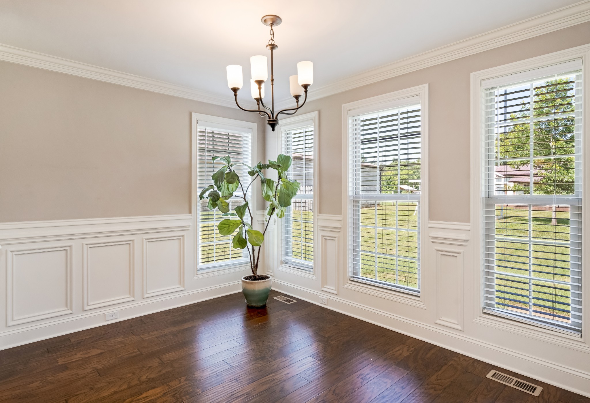 816 Burford Road Lebanon, TN 37087 - Photo 11 of 41 a view of an empty room with wooden floor and windows