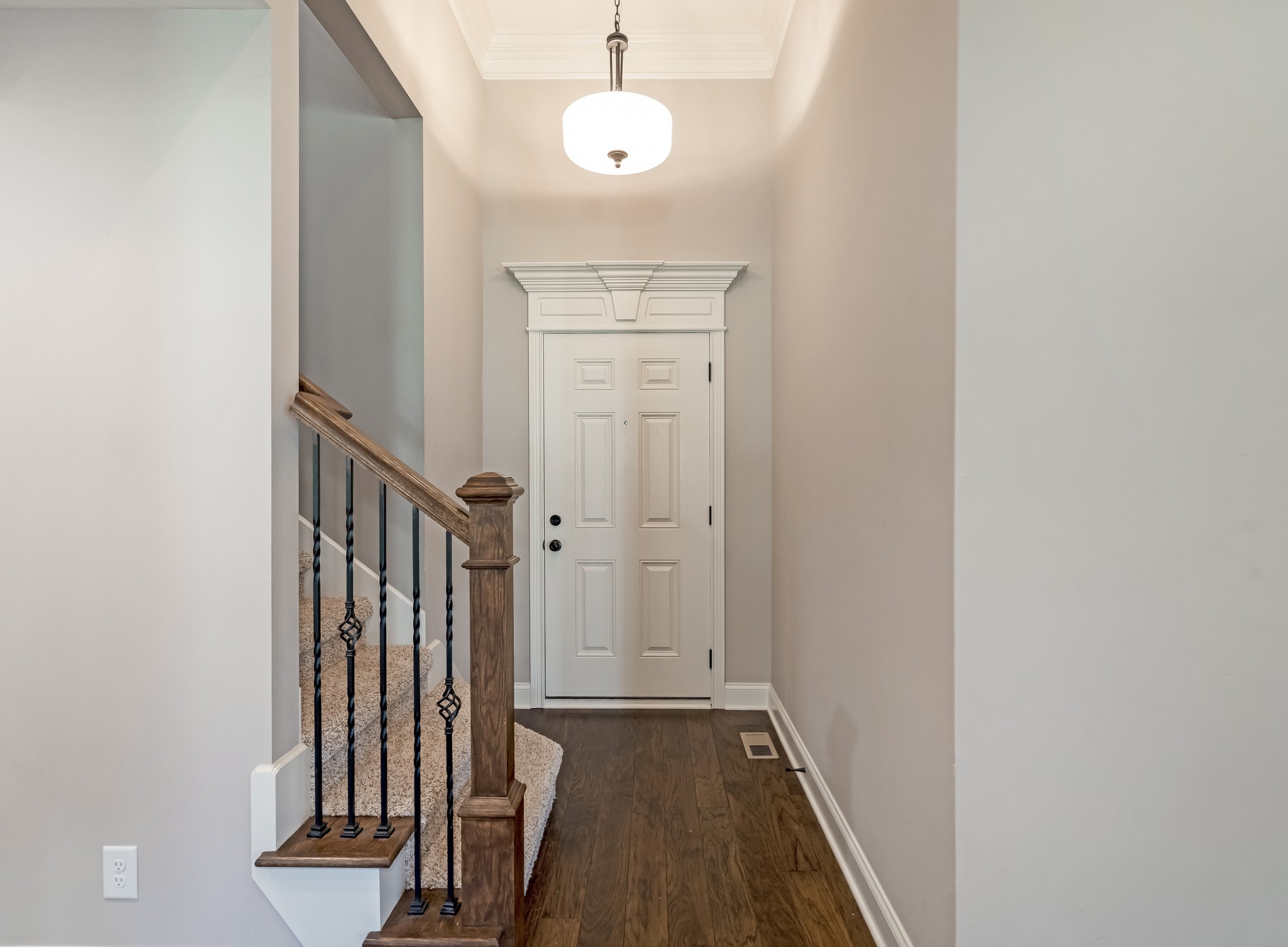 816 Burford Road Lebanon, TN 37087 - Photo 5 of 41 a view of a hallway with wooden floor and staircase