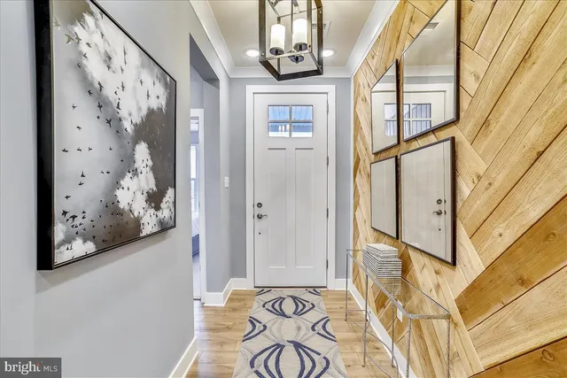 a view of a entryway with wooden floor