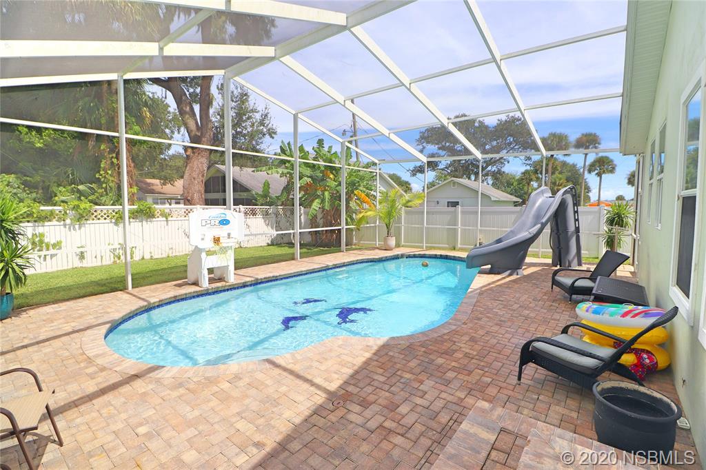 129 Rhode Island Street Edgewater, FL 32132 - Photo 38 of 49 a view of a room with gym equipment