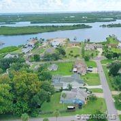 129 Rhode Island Street Edgewater, FL 32132 - Photo 49 of 49 a view of a lake with a city
