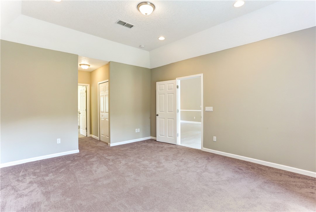 96921 Blackrock Road Yulee, FL 32097 - Photo 18 of 34 an empty room with closet area