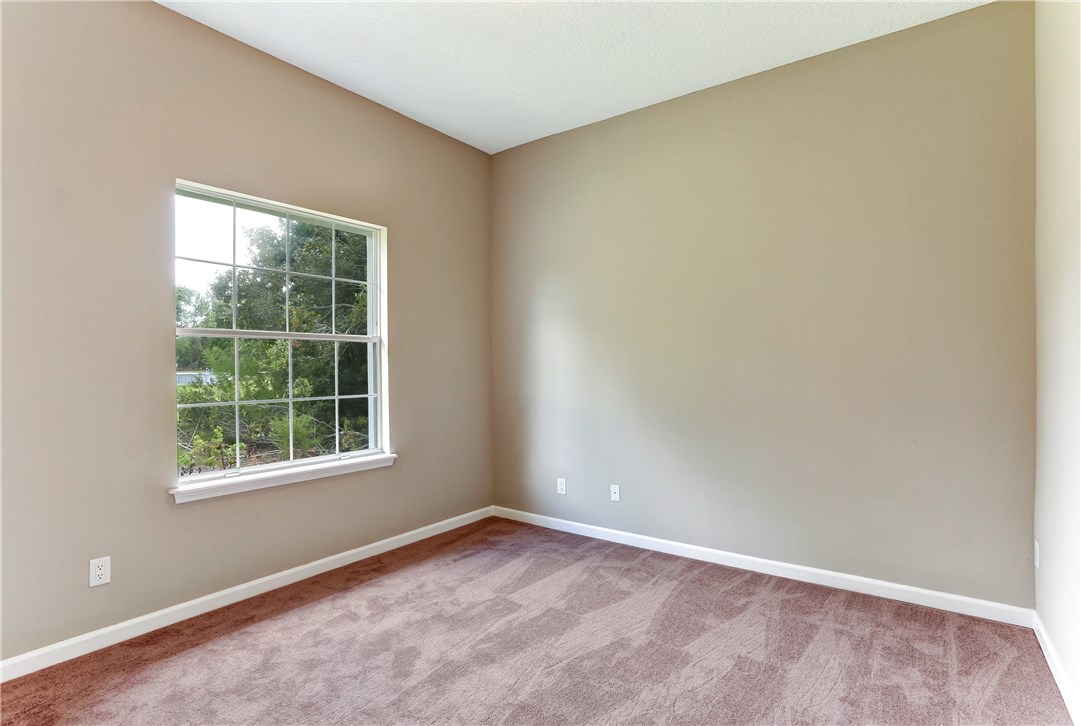 96921 Blackrock Road Yulee, FL 32097 - Photo 21 of 34 an empty room with a window